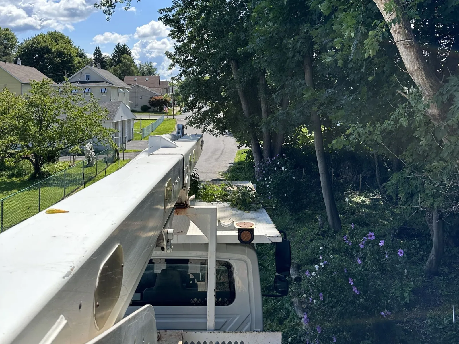 Bucket truck in a neighborhood